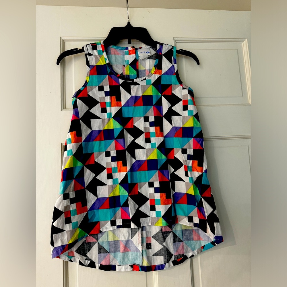 Sleeveless top from CW Kids. Never worn. Size 7/8.